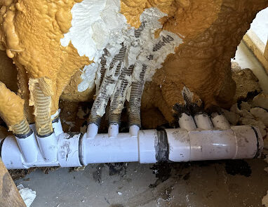 Hot tub water distribution pipes with insulation foam