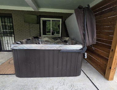 Raised hot tub on covered patio