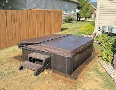 Raised hot tub with stairs finished installation