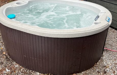 Oval hot tub restored